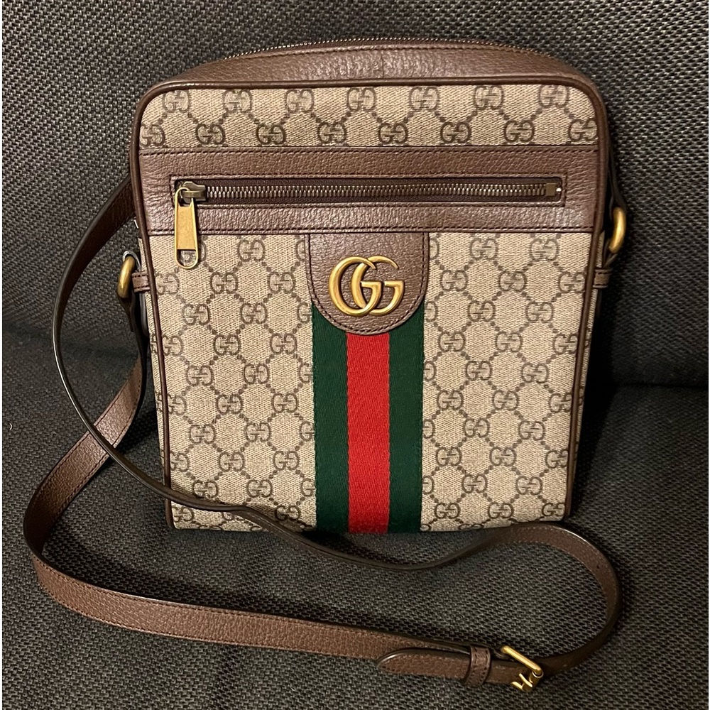 Gucci Beige messenger bag. GG supreme canvas with brown leather trim
